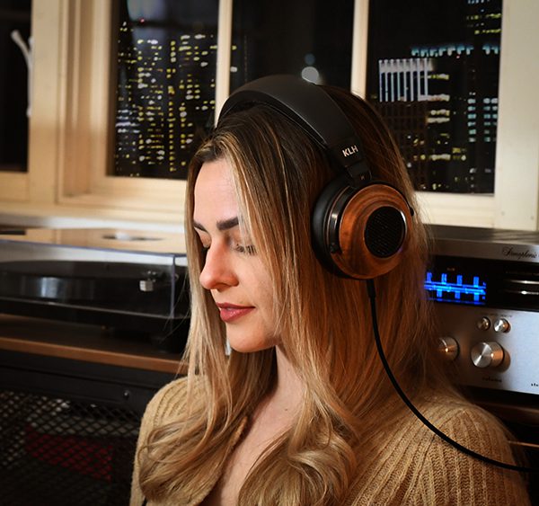 Girl listening to music with Ultimate one headphones