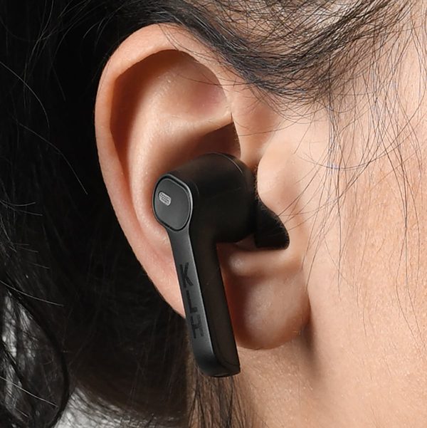 Closeup of Fusion earbuds in ear